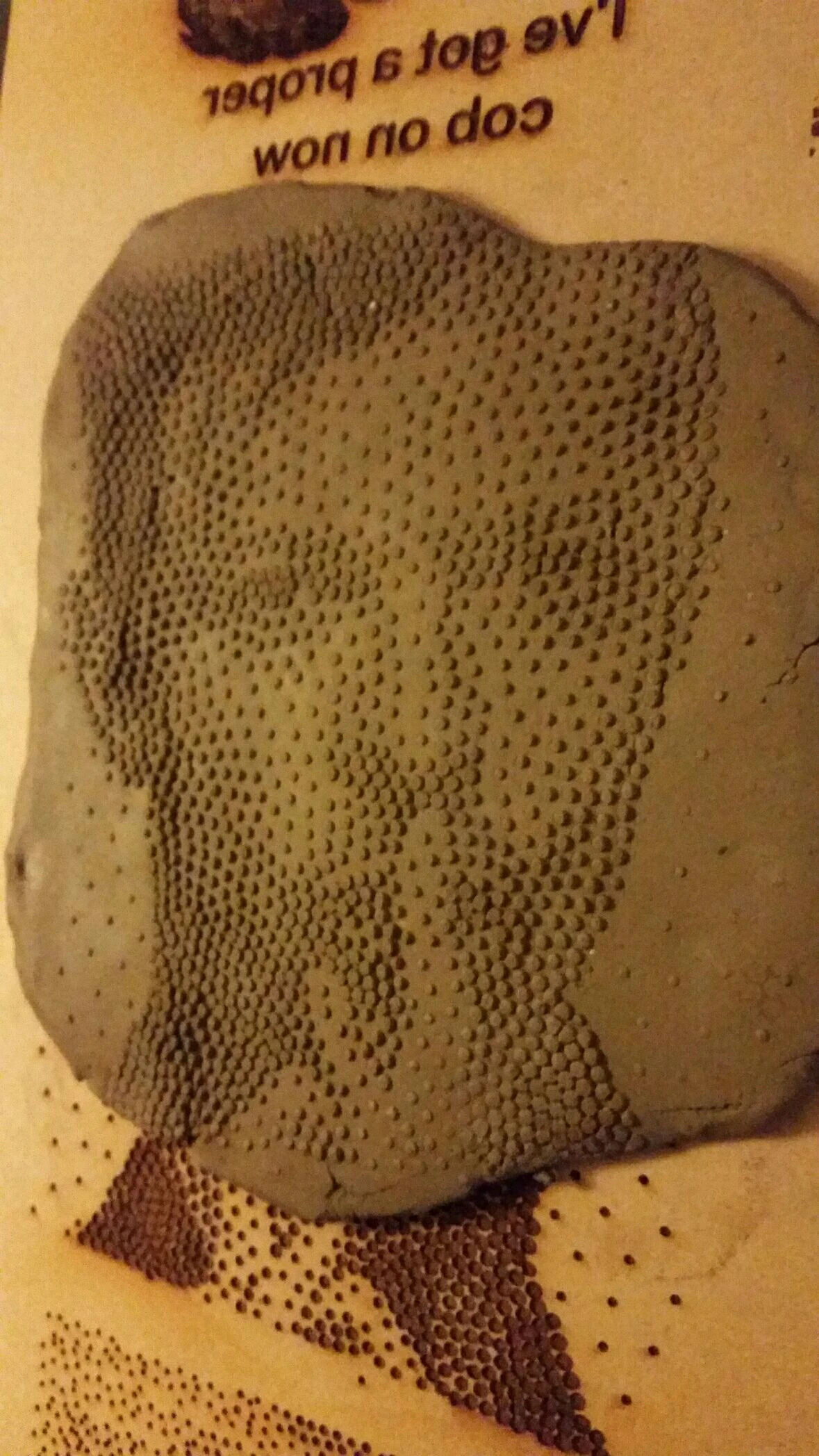 Dots-hidden portraits in clay