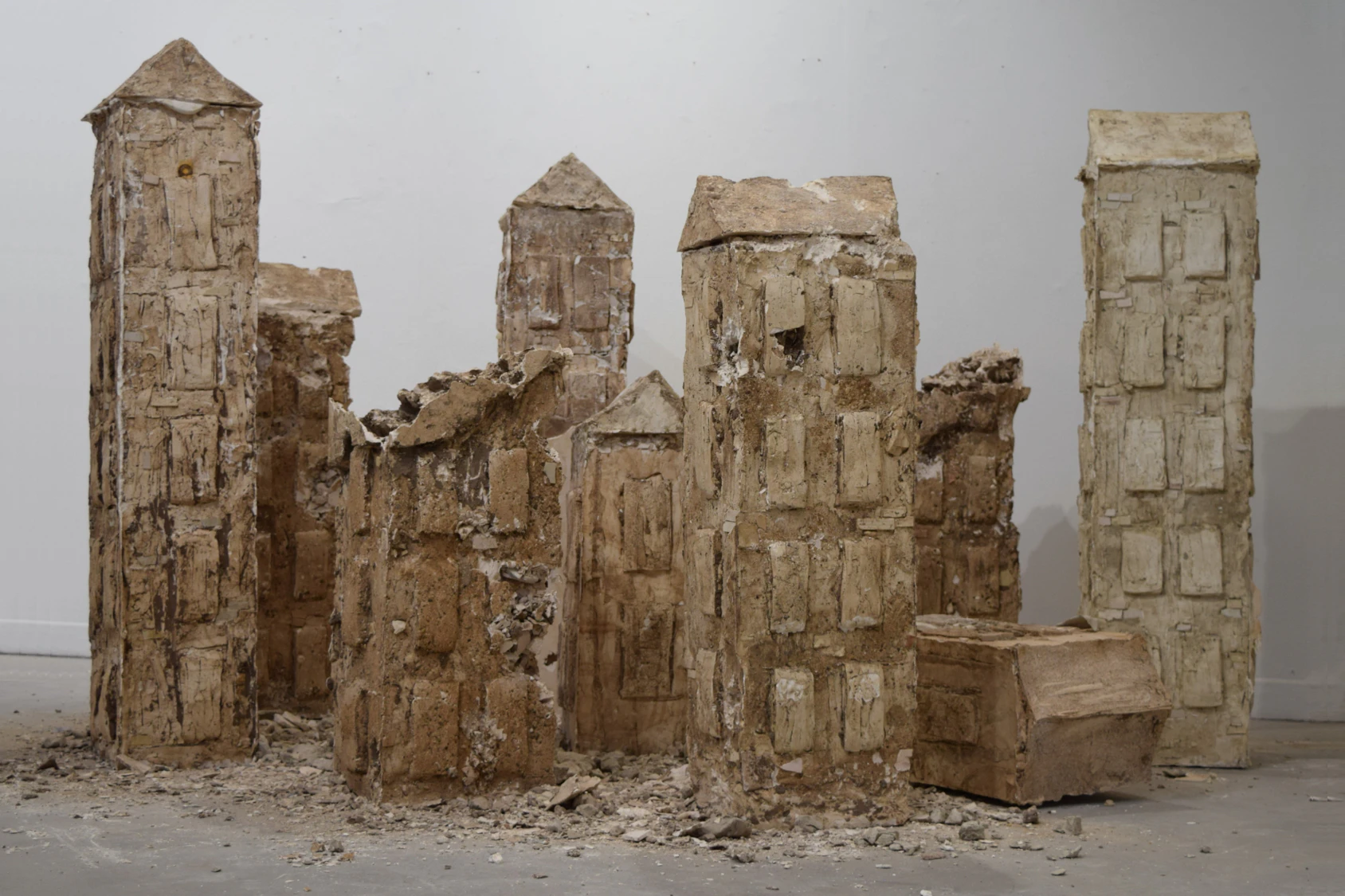 Far from Home, 2021. Plaster, Clay, Metal and Sand [Sculpture], 150x200x120cm (Variable). by Sara Kew Osman...