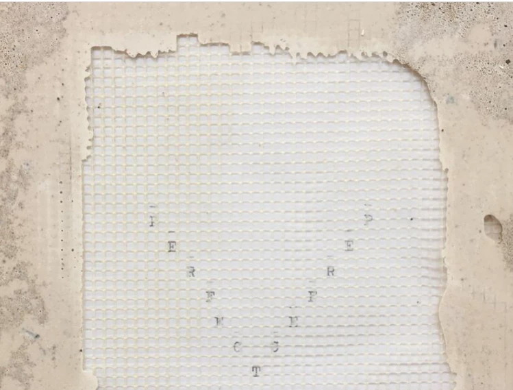 Perfect Tiles, 2020. Typewritten text embedded into Plaster [Installation], 4 tiles: 15 x 10 x 1.5 cm