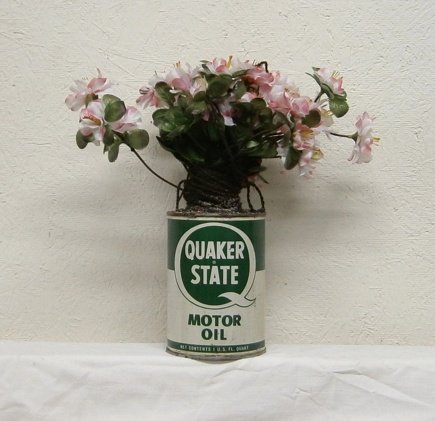 Flowers In Oil Can
